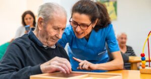 a senior man with his caregiver